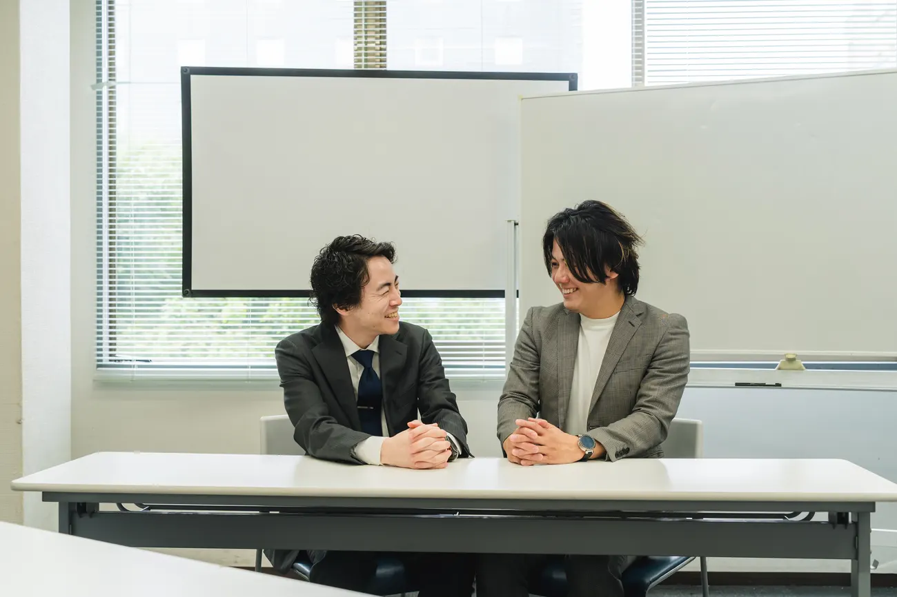 面談をするコーチ